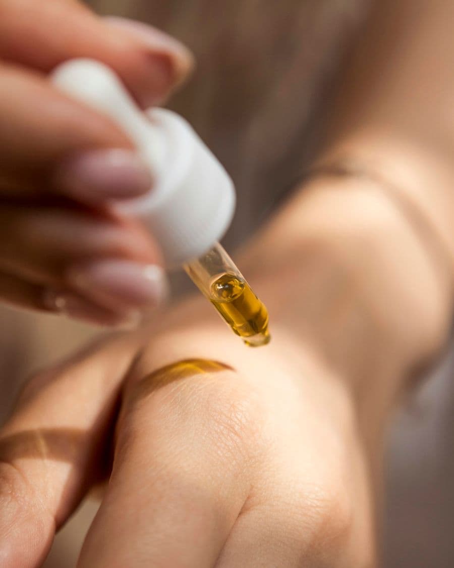 Chemical peel serum being applied (photo: Enecta Cannabis extracts, Unsplash)